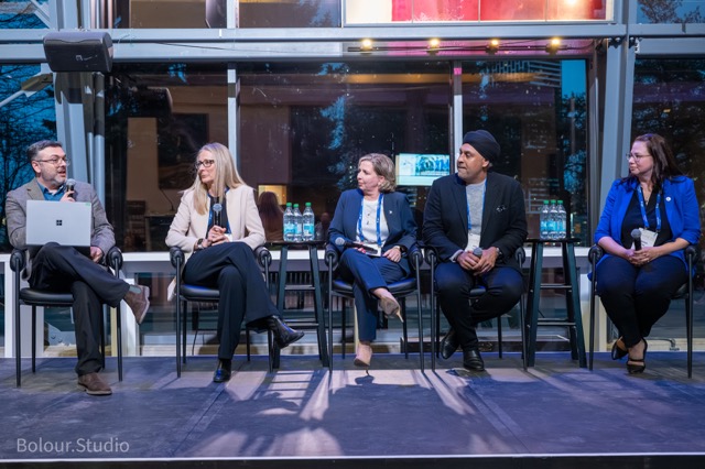 Debate panel at InspireHER 2026
